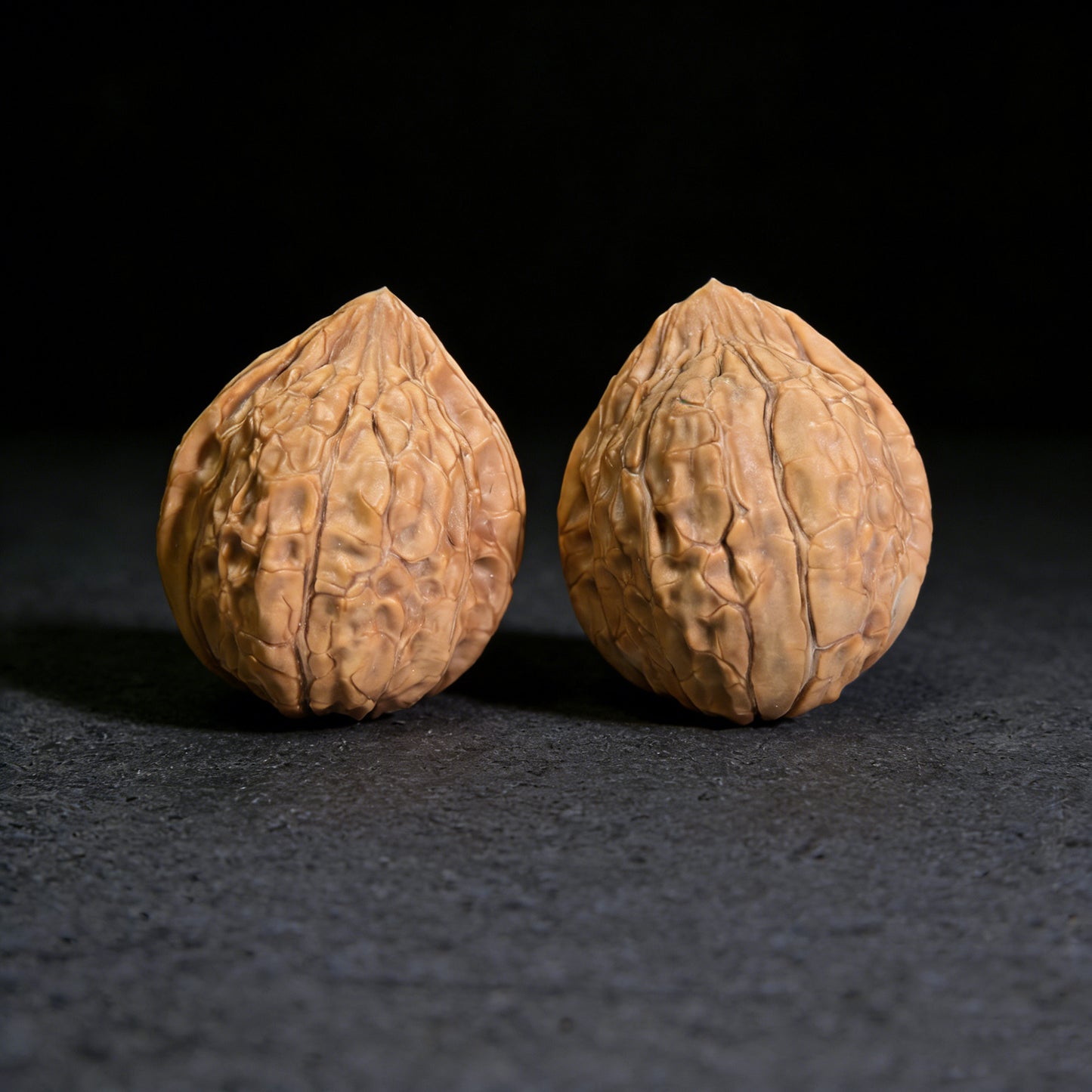 Pair of walnut hand exercisers with tortoiseshell pattern, 33mm x 38mm, from ThePatinaProject GJW-301.