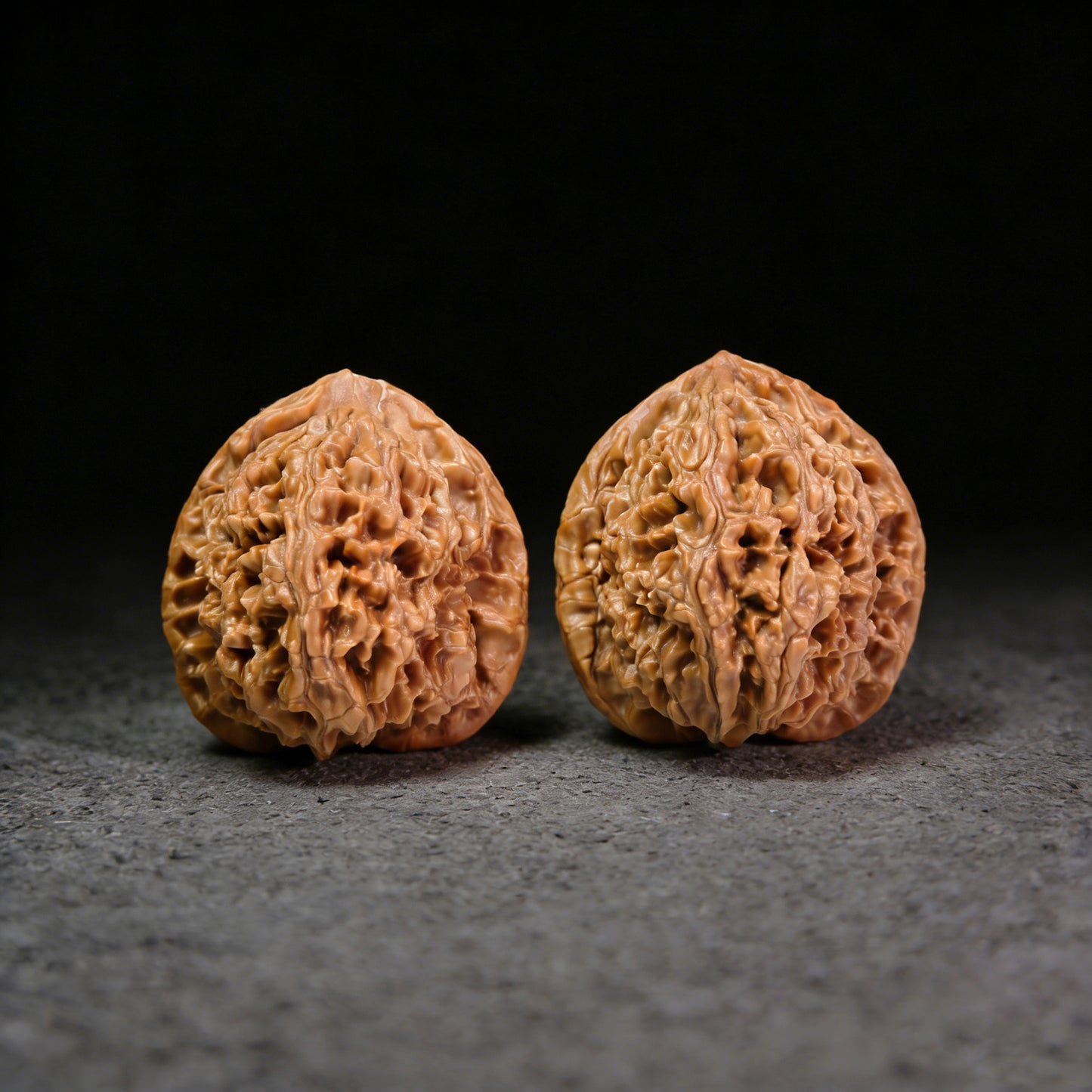 Pair of Walnut Water Dragon Pattern hand exercisers from ThePatinaProject, collector grade, 42mm x 44mm, model SLW-401C.