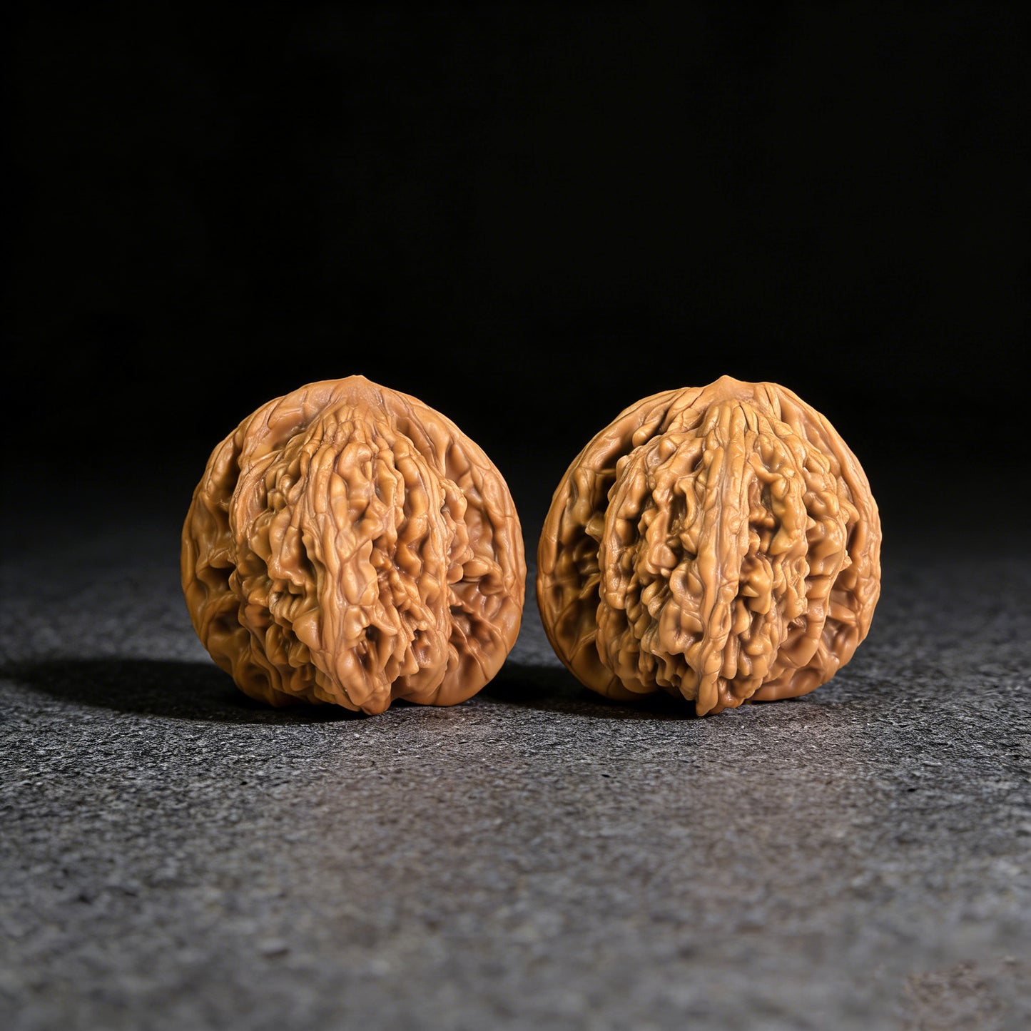 Pair of Wheat Ear Liger walnut hand exercisers with 47mm x 44mm size, featuring detailed wheat ear and lion designs.