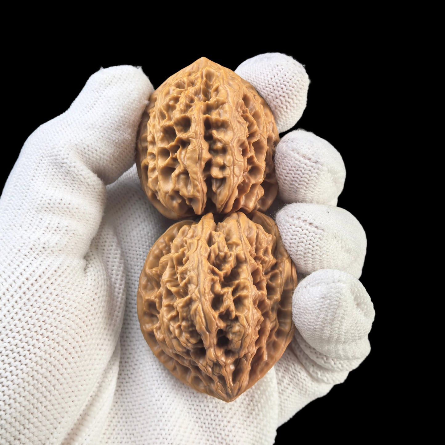 Pair of walnut hand exercisers featuring lion head design, 35mm size, from ThePatinaProject's Wild Bull Yeniu collection.