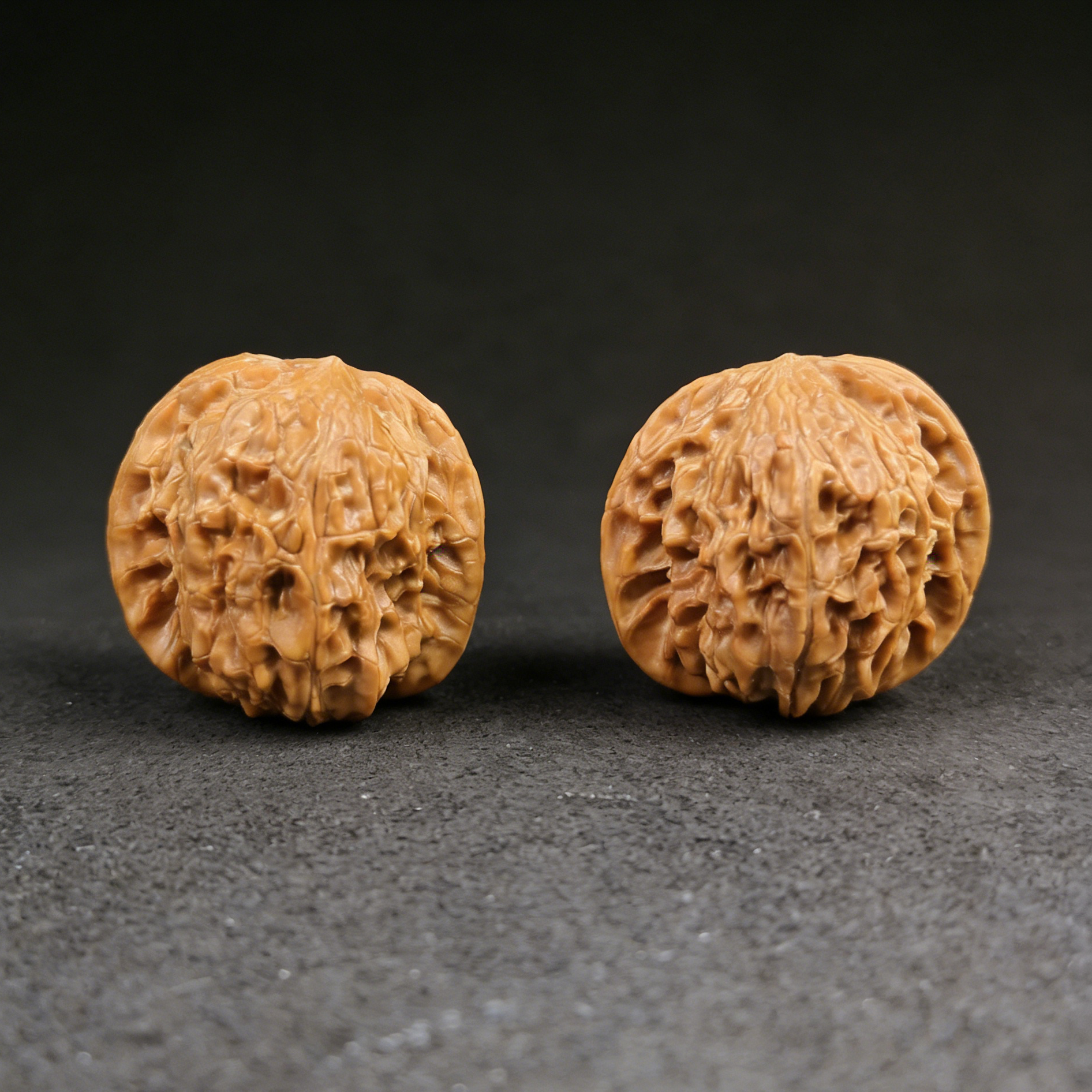 Walnut hand exercisers from ThePatinaProject, Wild Millstone (Mo Pan) 38mm fast-coloring starter pair for beginners.