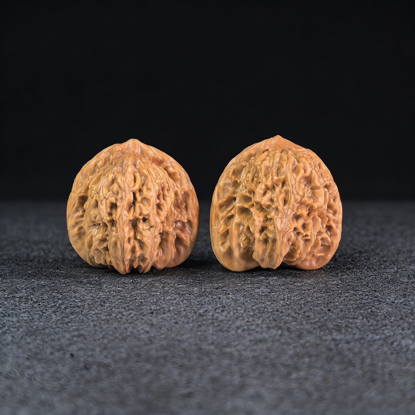 Pair of Xia Yun Ling Walnut Hand Exercisers with lion head design, 36mm size, from ThePatinaProject.