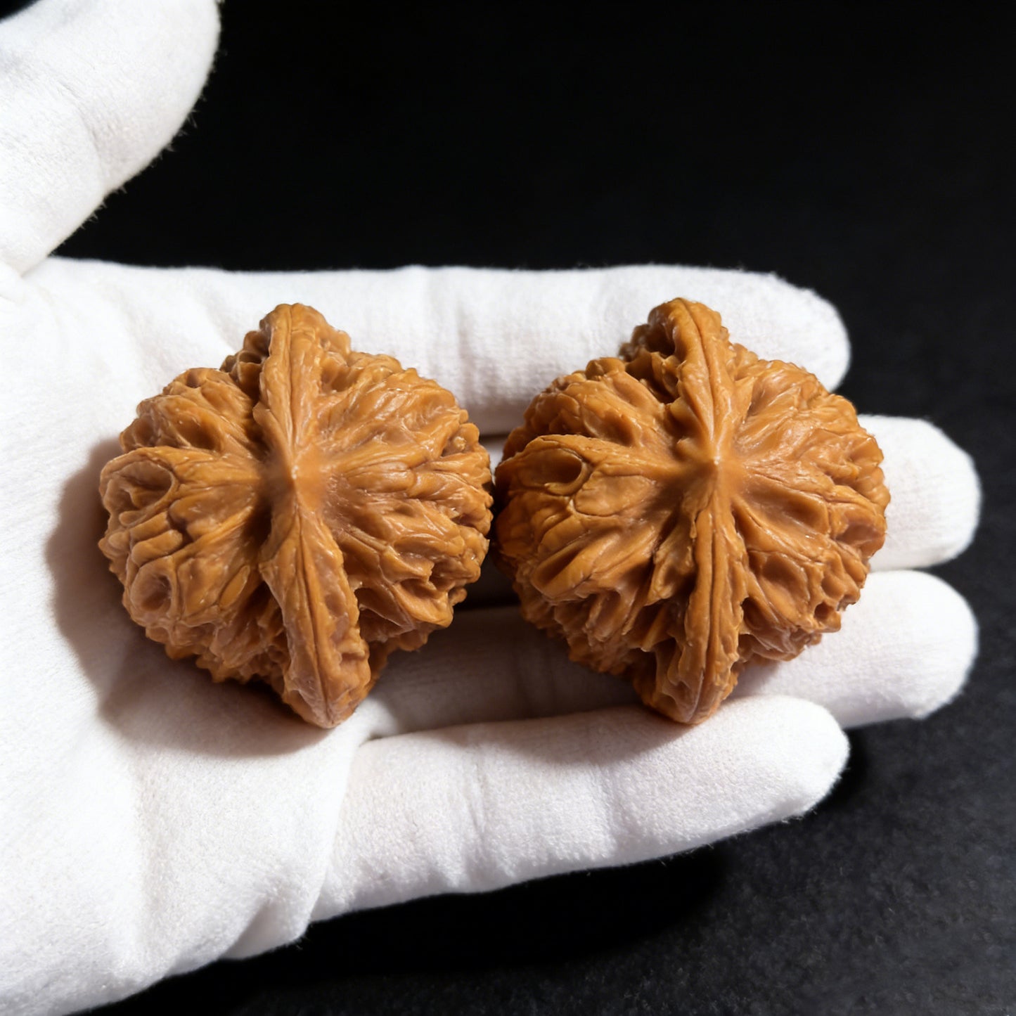 Pair of Xia Yun Ling Walnut Hand Exercisers by ThePatinaProject, 43mm x 40mm, showcasing smooth wooden texture and ergonomic design.