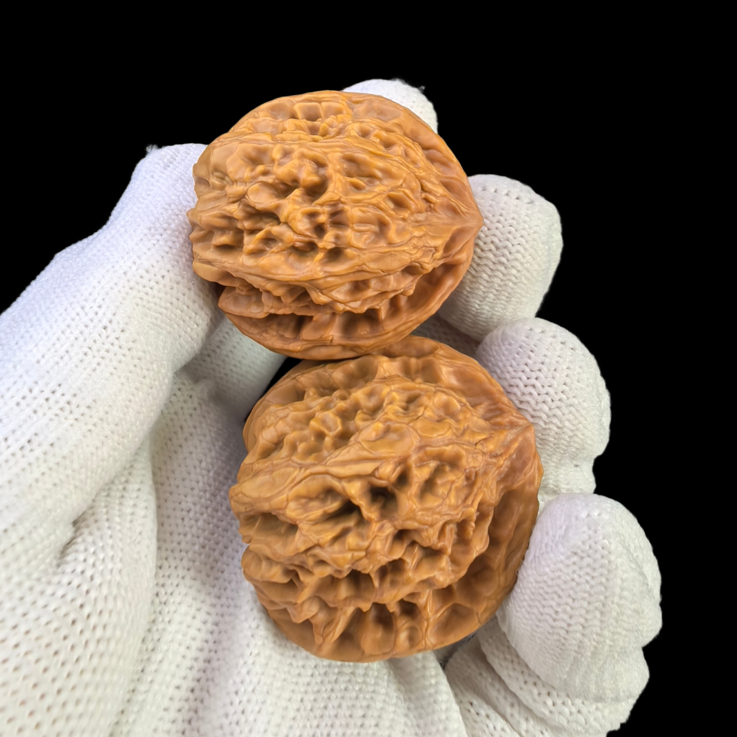 Walnut hand exerciser from ThePatinaProject, Ye Niu (Wild Buffalo) pair, 33mm diameter, YN-02 model for grip strength training.