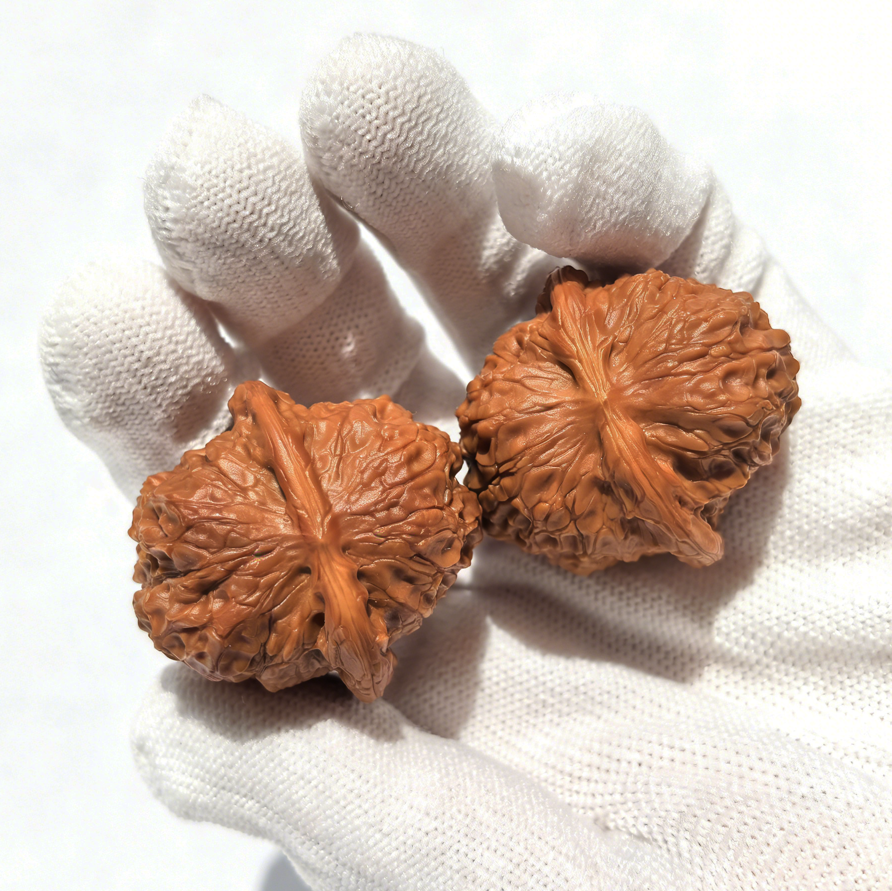 Unique Blood Kirin collector’s Wenwan walnuts by ThePatinaProject, hand-selected walnut hand exercisers with intricate natural patterns.