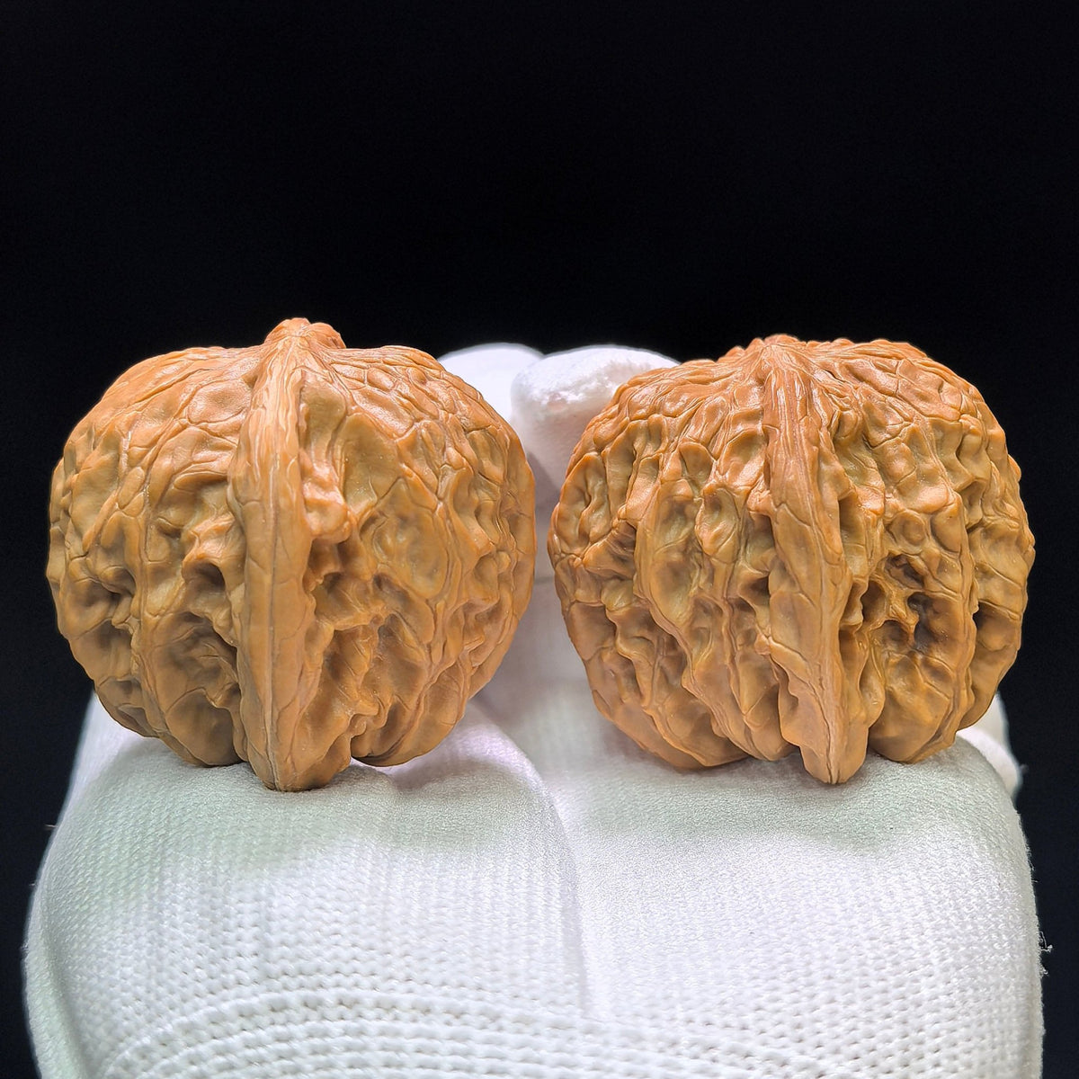"Wild Millstone Angel Wings" Ye Mopan Tianshi Zhiyi Wenwan Walnuts (Pair) | 40.0mm x 40.0mm | Stock ID: YMPTSZY-1401 - ThePatinaProject